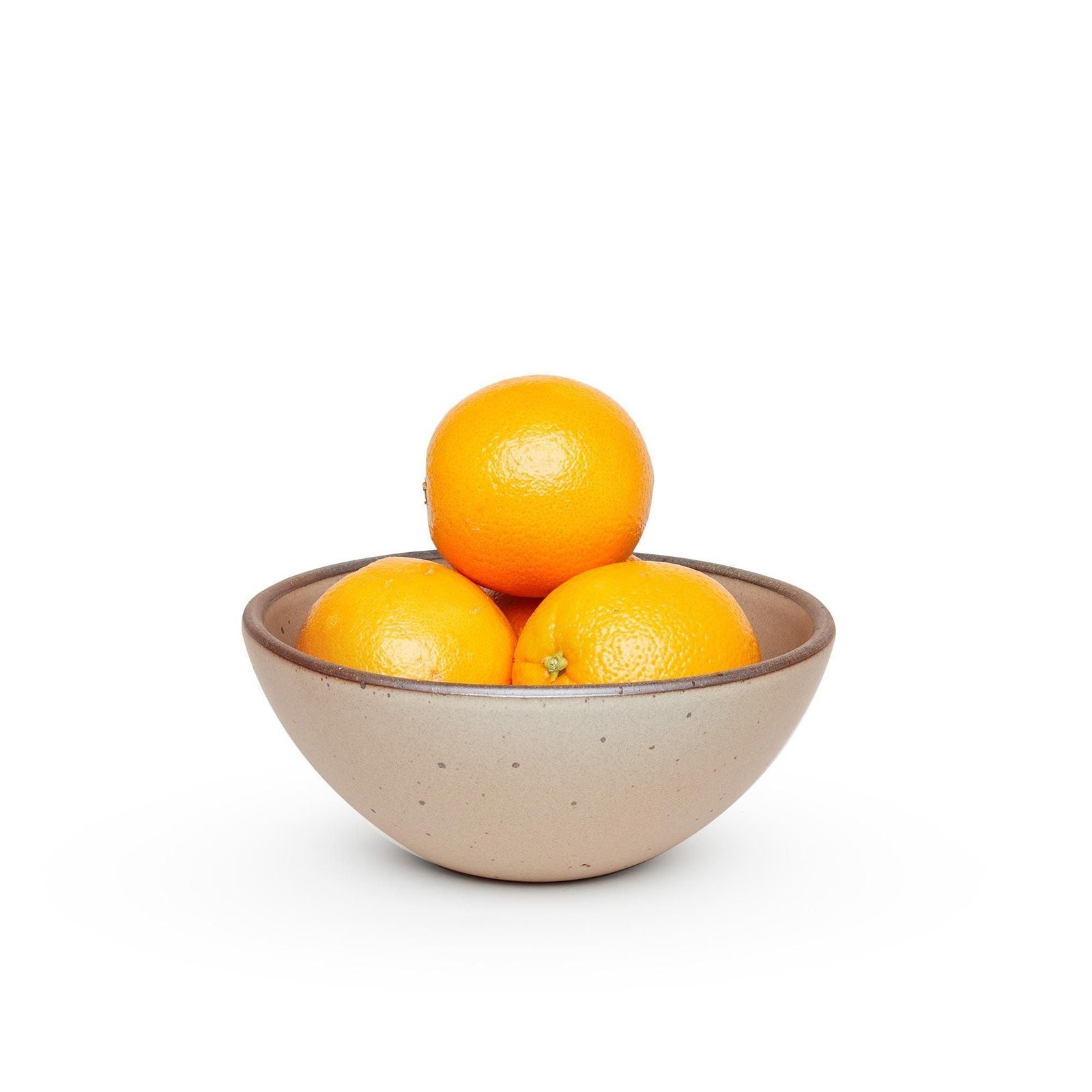 Vellax Supply soup bowl in Warm Taupe, shown with oranges
